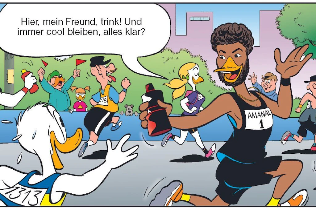 Mit Schnabel: Deutschlands bester Marathon-Läufer Amanal Petros hilft Donald Duck.