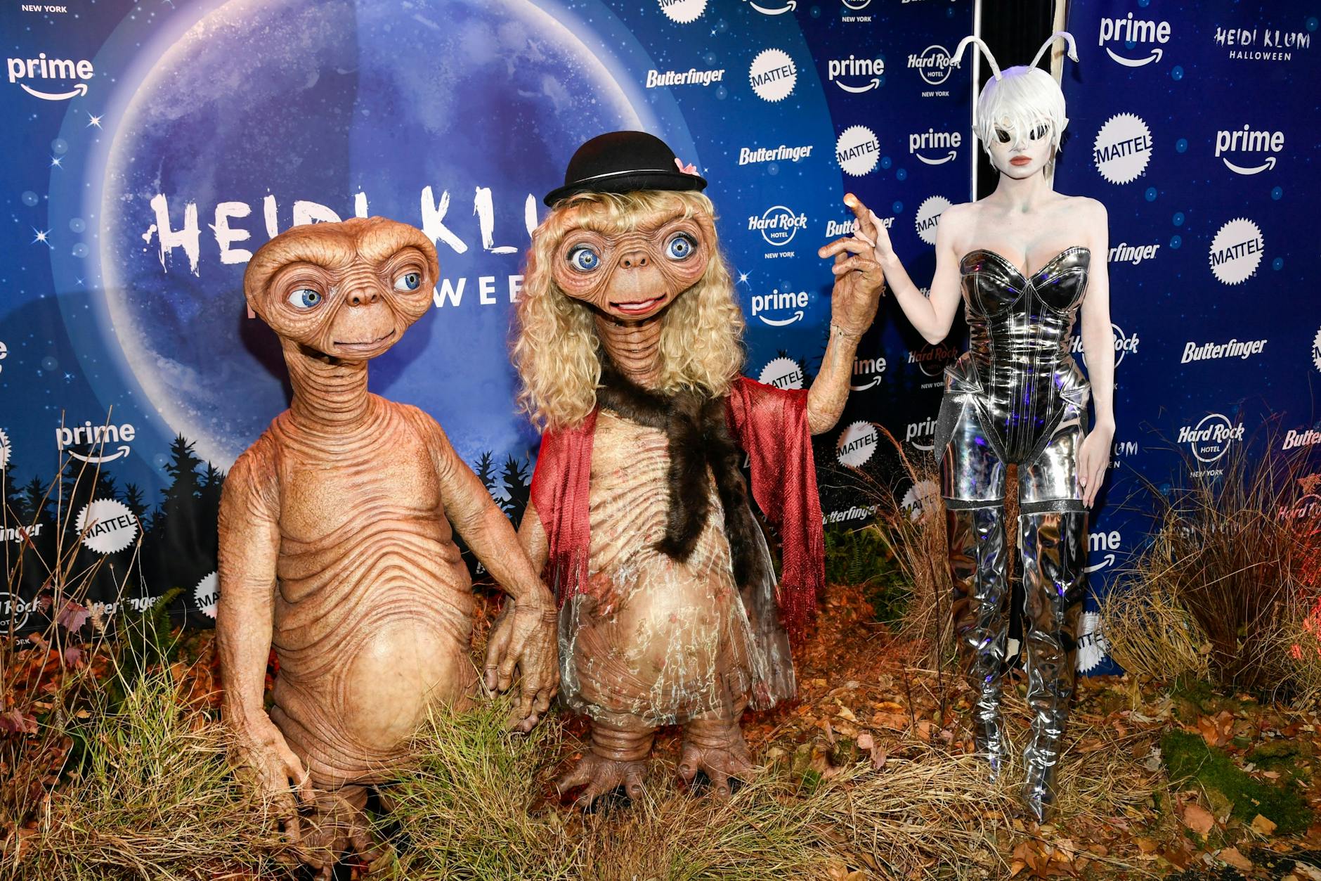 Eine Familie aus dem Weltall: Heidi Klum (Mitte) und Tom Kaulitz (li.) als E.T. der Außerirdische, Leni Klum als Alien.