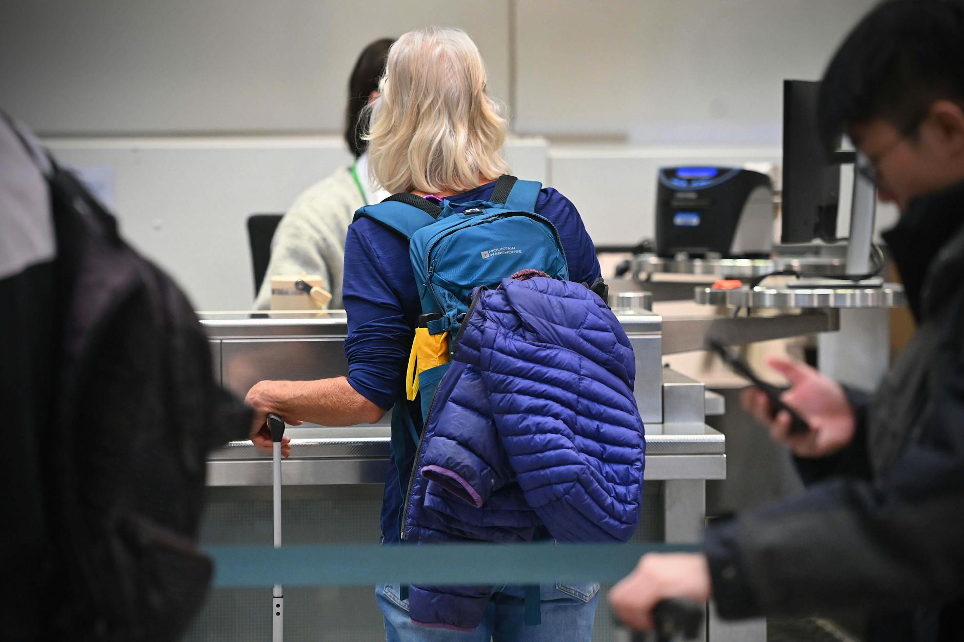 Fluggaeste am Flughafen Franz-Josef-Strauss in München.