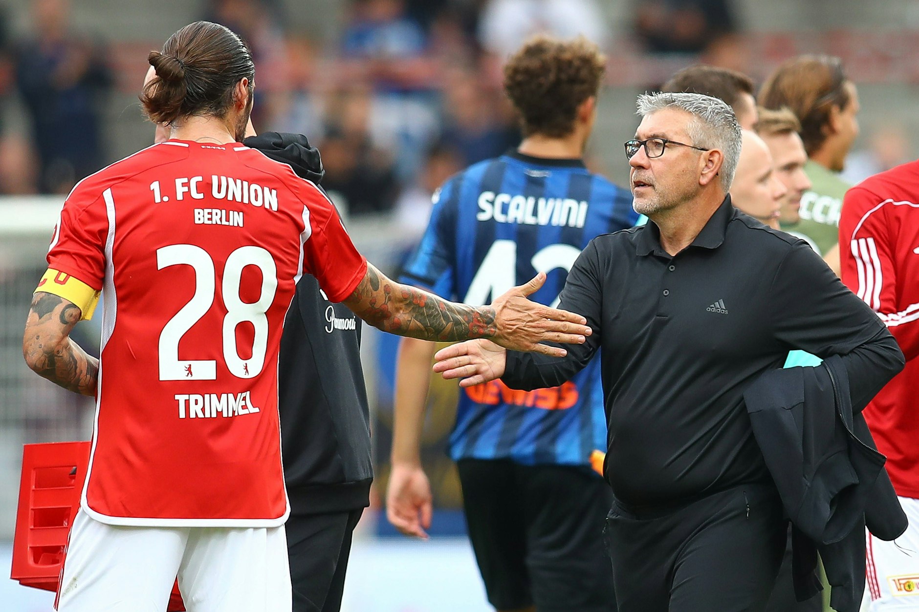 Ein Bild aus erfolgreichen Tagen beim 1. FC Union Berlin: Urs Fischer (r.) mit Kapitän Christopher Trimmel.
