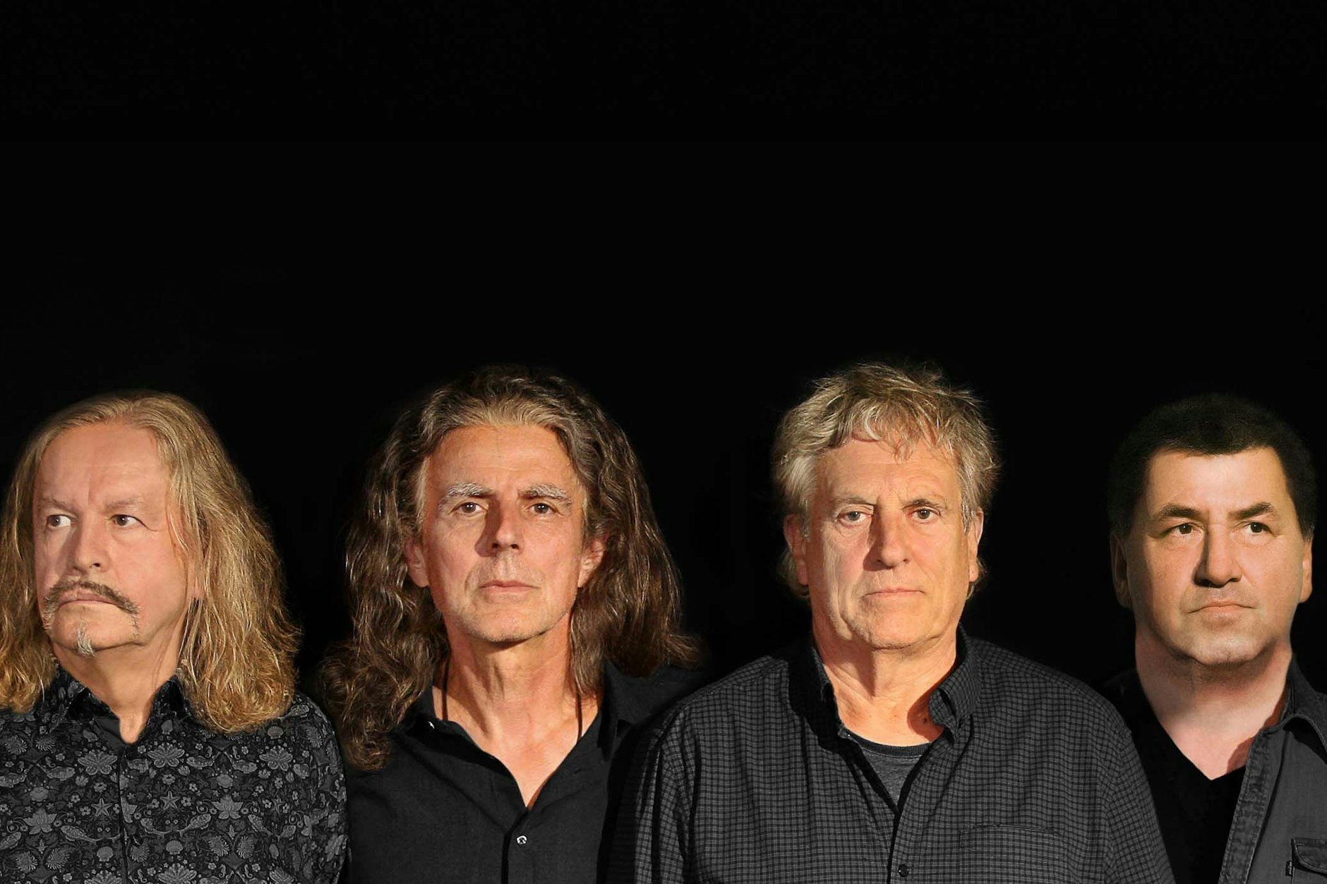 Peter Rasym (Bass), Gisbert Piatkowski (Gitarre), Thomas Schoppe (Gesang und Gitarre) und Olli Becker (Drums) von der Renft-Band (v.l.n.r.)