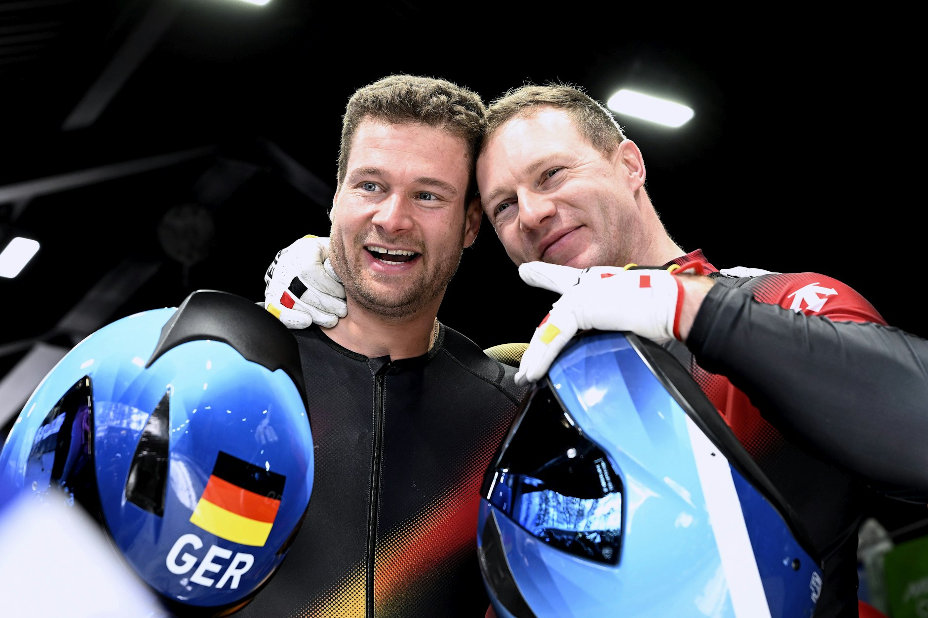 Selten gewordene deutsche Erfolgsgesichter im olympischen Wintersport: Die Bobfahrer Johannes Lochner und Francesco Friedrich (v.l.) gewannen jeweils im Zweier- und Viererbob die Gold- und Silbermedaillen.