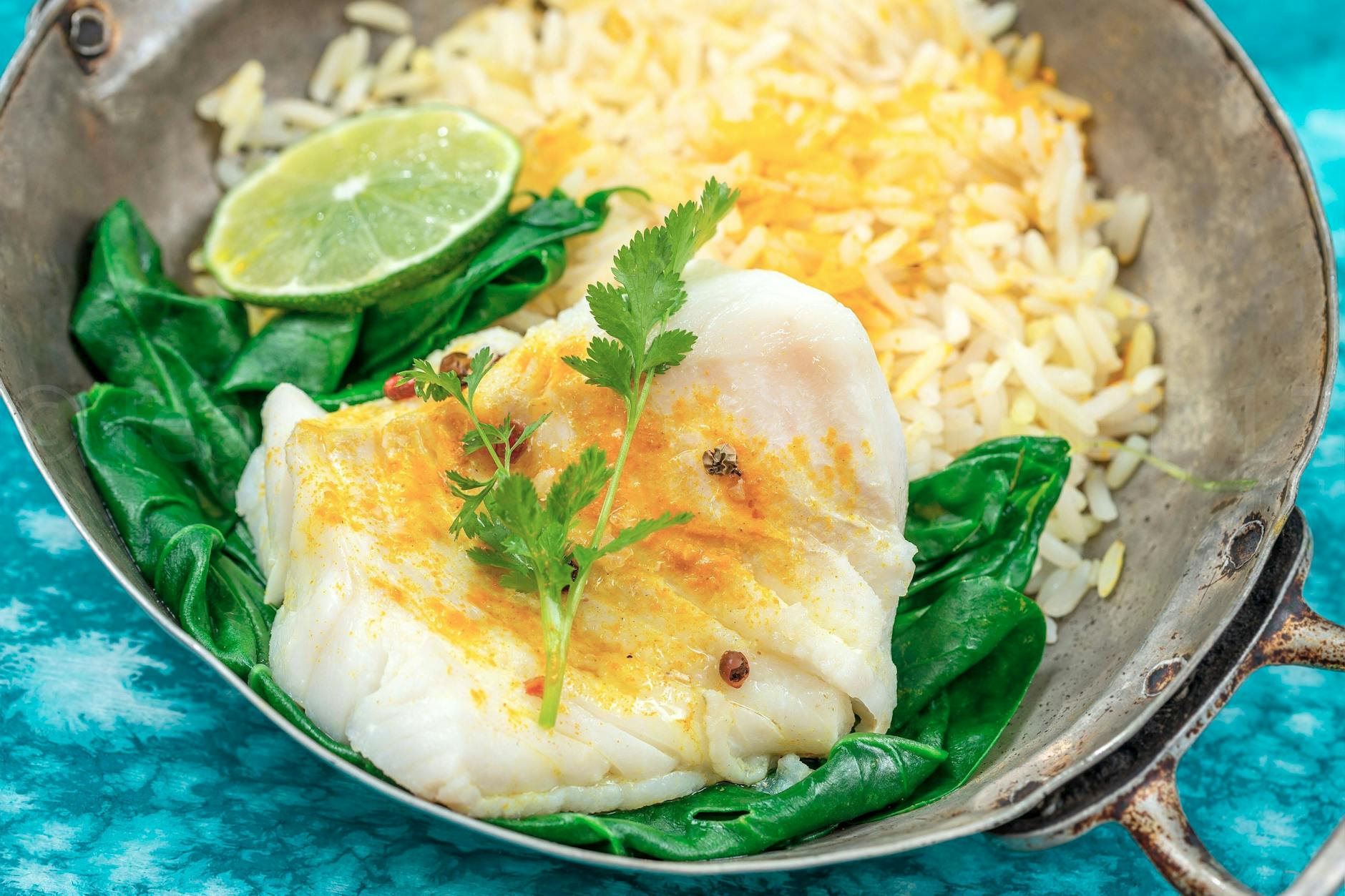 Leicht, aber sättigend: Skrei mit Spinat und Reis.