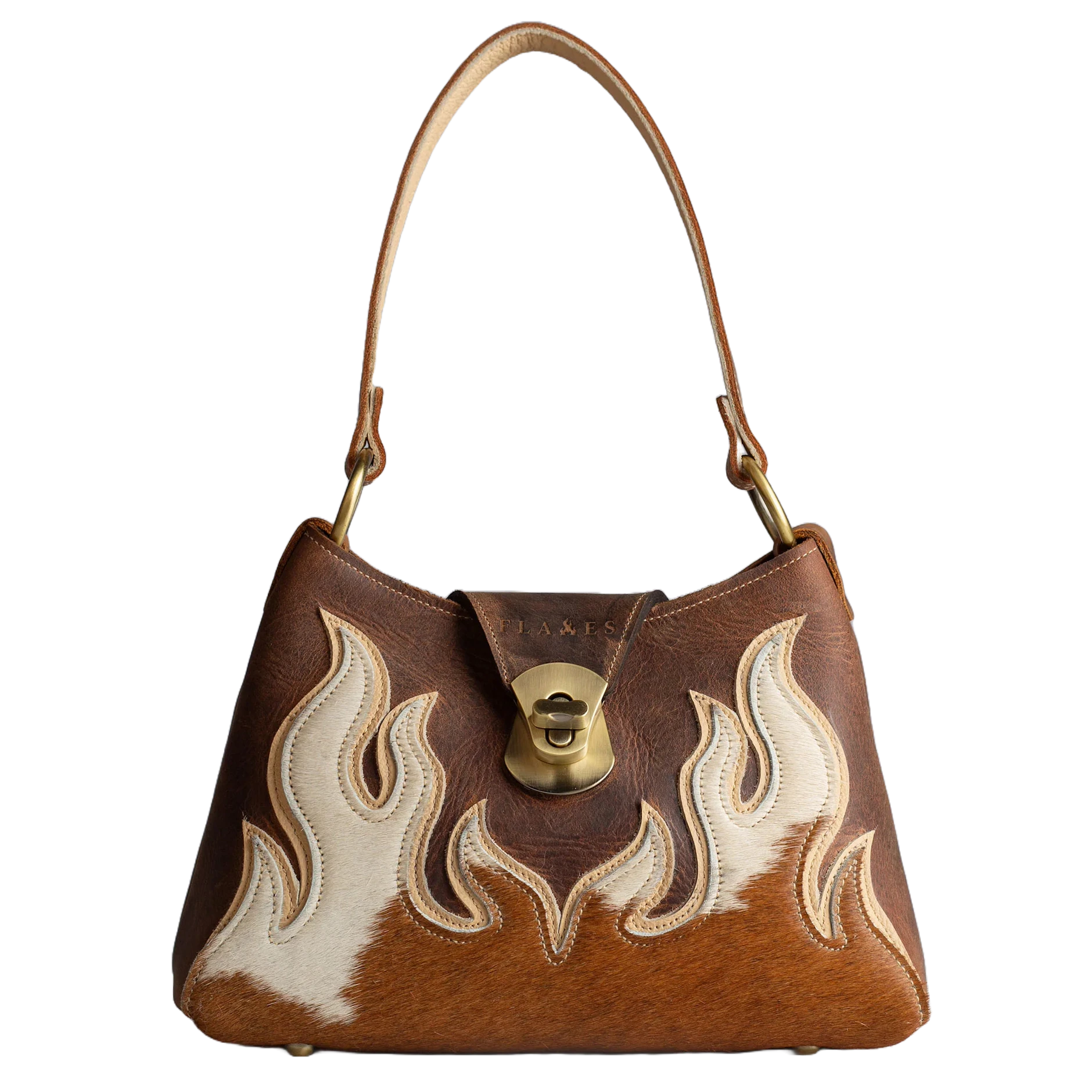 Feuerzeichen trifft auf Handwerkskunst: Jede Flames-Tasche ist ein Unikat, das die innere Flamme zum Strahlen bringt – individuell, charakterstark und handgefertigt in Eindhoven