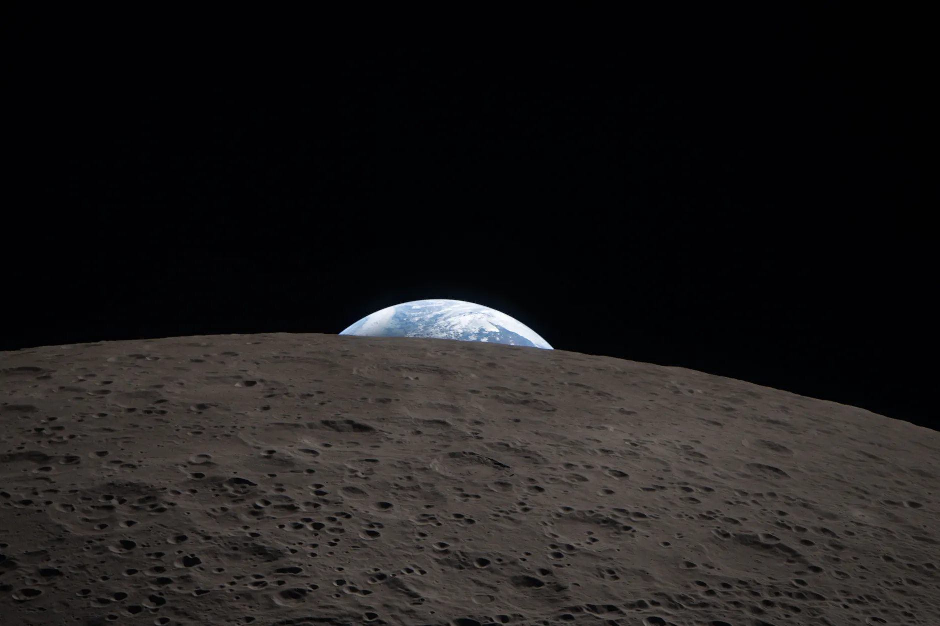 Dieses von der Nasa veröffentlichte Bild zeigt die Erde, wie sie aus Sicht der Artemis-II-Crew hinter dem Mondhorizont verschwindet.