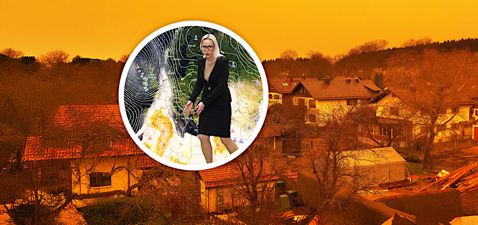 Der Saharastaub kann, wenn er besonders stark auftritt,  den Himmel rot färben - wie hier im Jahr 2021 in Bayern. Wetter-Expertin Kathy Schrey warnt aktuell wieder vor Blutregen.