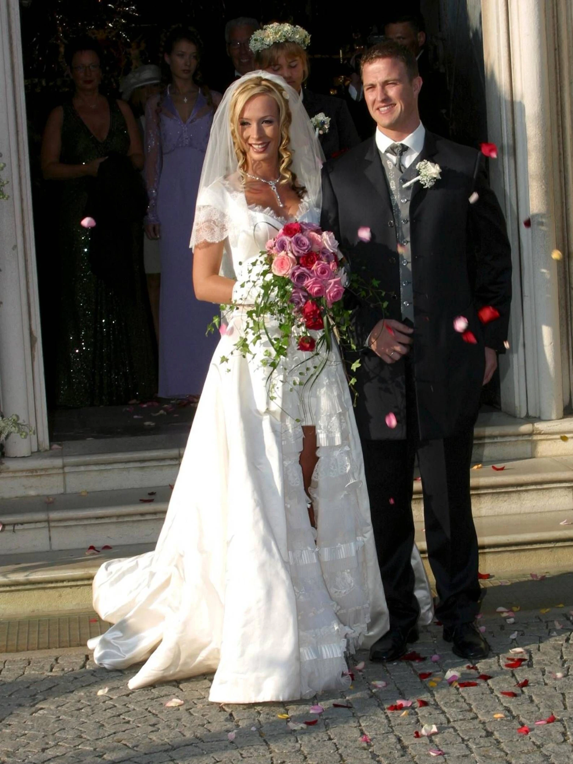 Cora und Ralf Schumacher bei ihrer Hochzeit 2002.