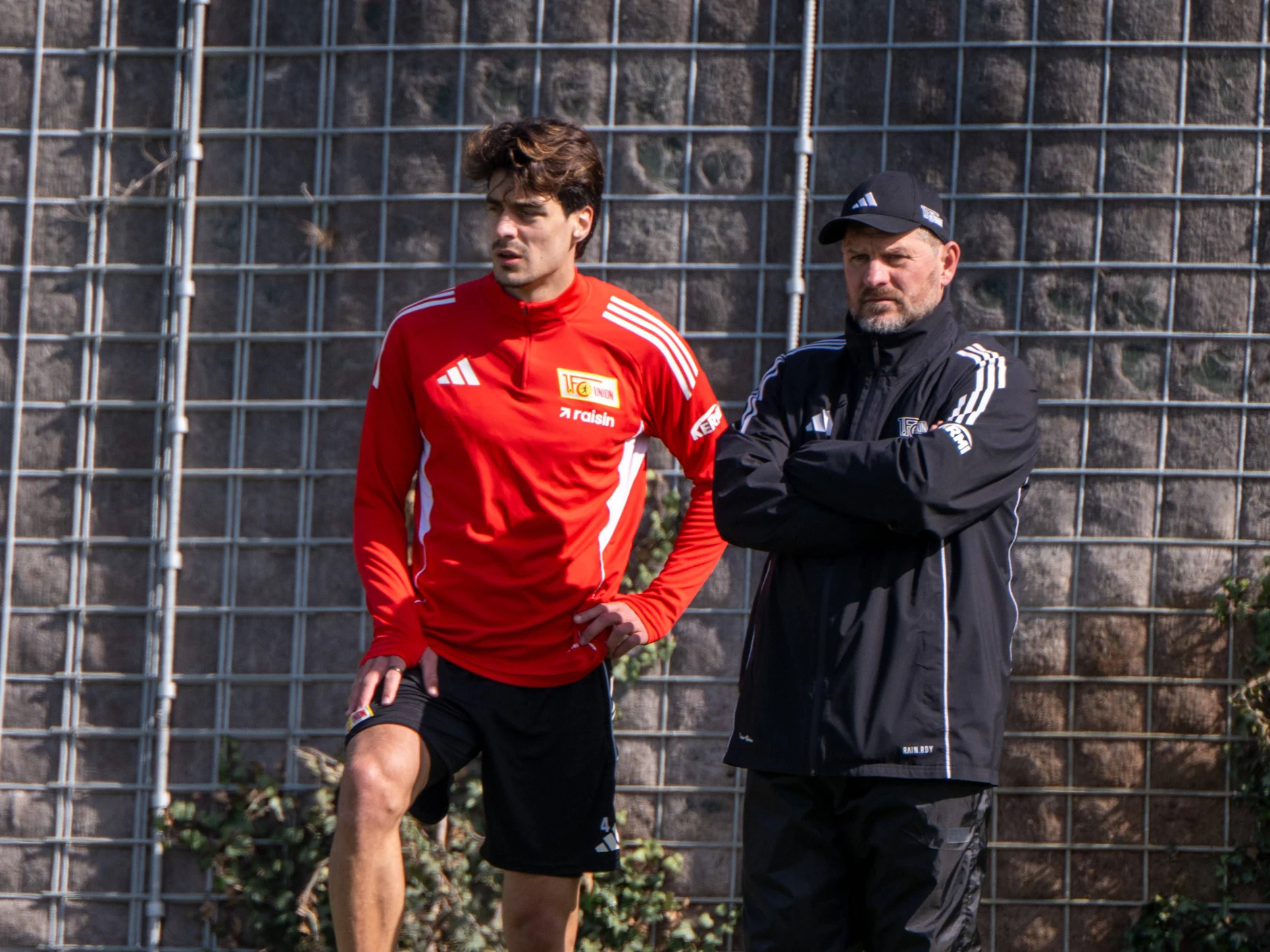 Verteidiger Diogo Leite und Unions Ex-Trainer Steffen Baumgart.