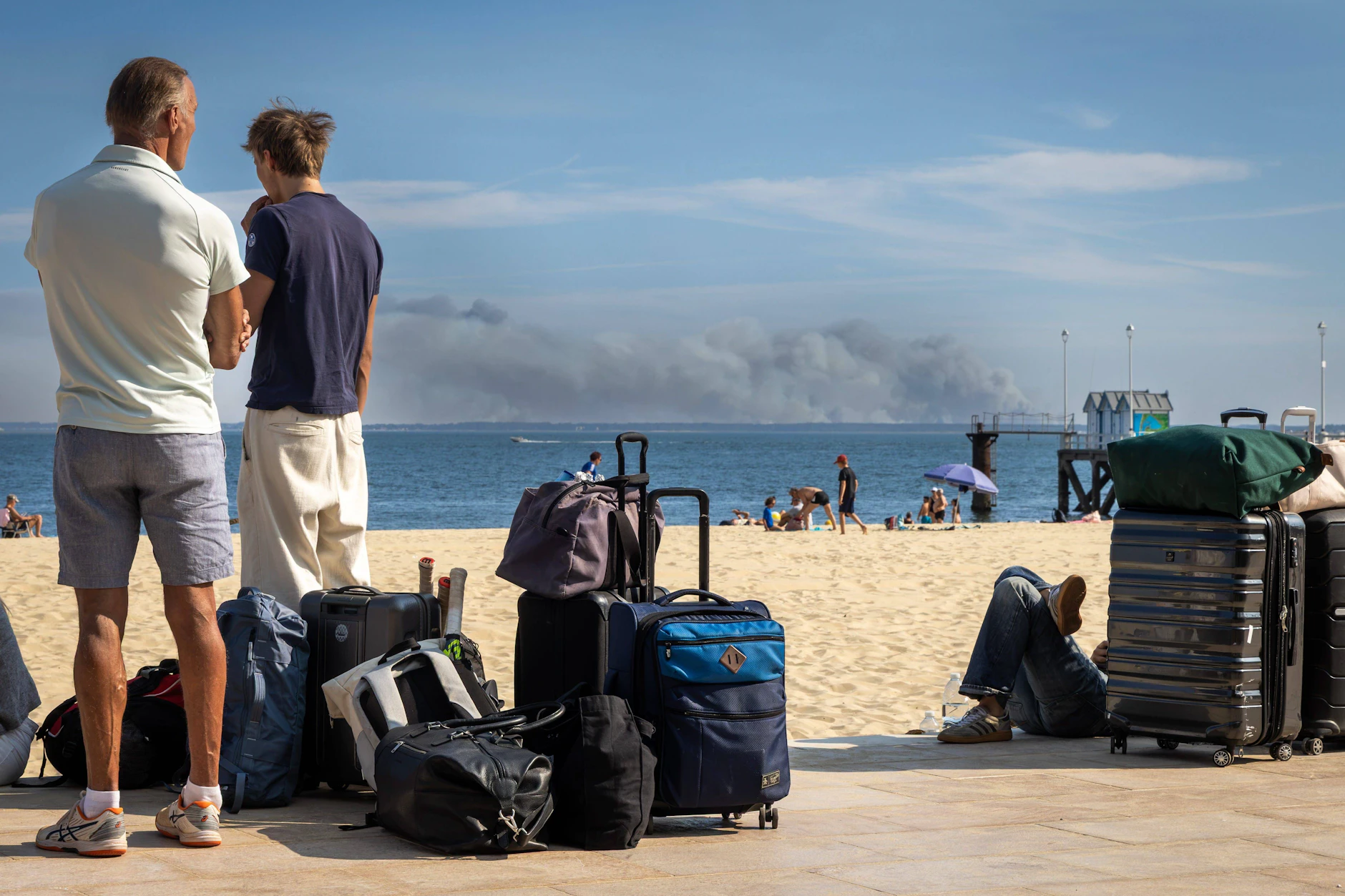 Urlauber, die per Boot von Cap Ferret evakuiert wurden. Alle Einwohner und Feriengäste wurden aufgefordert, das Gebiet zu verlassen.