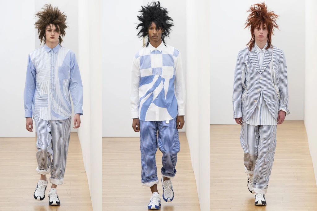 Hickory-Jeans bei Comme des Garçons Shirt: Die blau-weiß gestreifte Workwear-Hose wird zum Spätsommertrend.