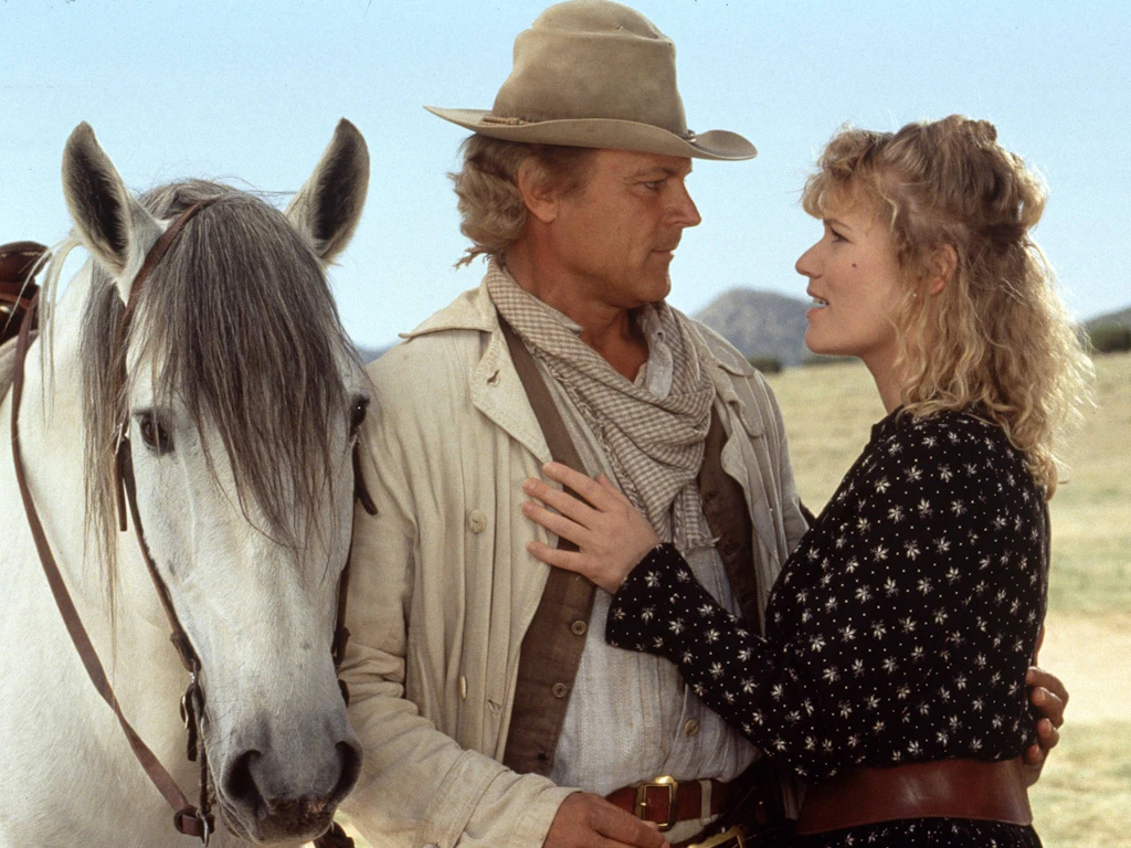 DDR-Star Anne Kasprik: In der Western Komödie „The Troublemaker“ (1994) kam sie Terence Hill ganz schön nah.