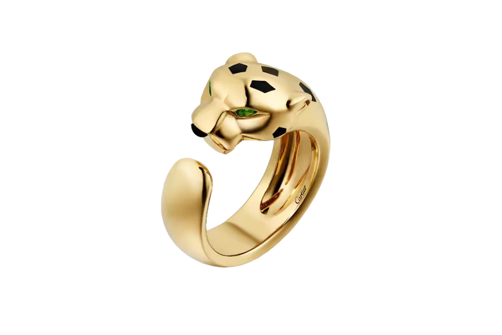 Ring „Panthère de Cartier“, mittleres Modell, aus 18 Karat-Gelbgold mit Tsavoriten, Onyx und schwarzem Lack, Cartier, 8000 Euro.
