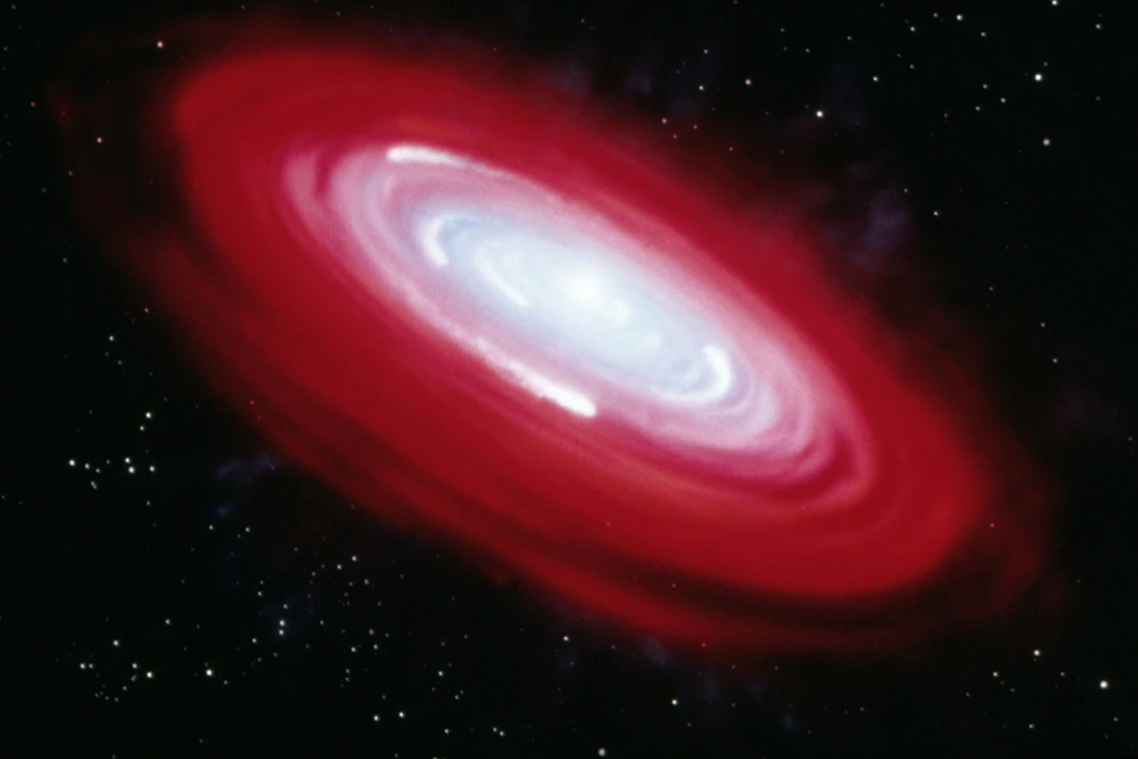 Illustration des Sterns Beta Pictoris mit einer Scheibe aus Gas und Staub. Das Forschungsteam ordnete Radiowellen einem Planeten zu, der den Stern umkreist.