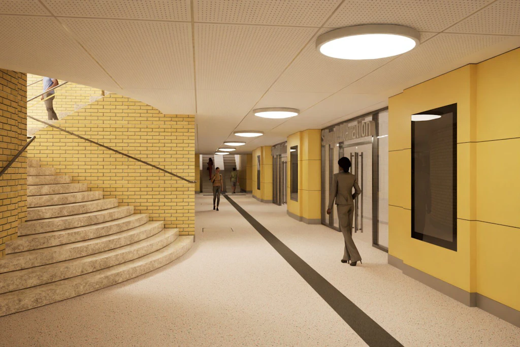 Im Untergeschoss sollen frühere Angsträume verschwinden. Die Visualisierung zeigt, wie der Treppenbereich in Richtung U-Bahn künftig aussehen wird.